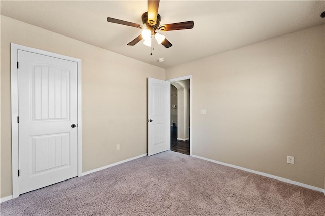 2504 Maplewood Ave, Lowell, AR 72745 - unfurnished bedroom with carpet flooring and a ceiling fan