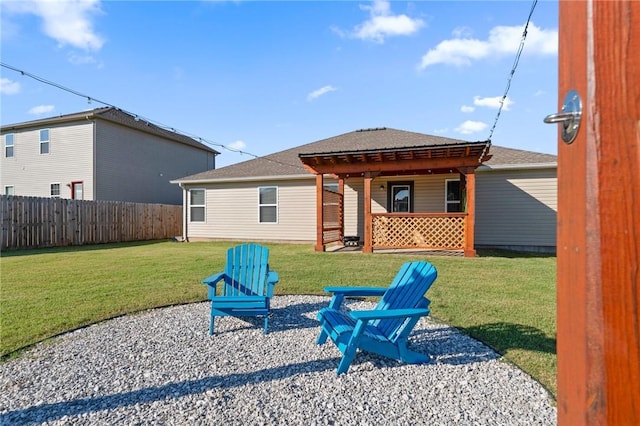 2504 Maplewood Ave, Lowell, AR 72745 - back of house featuring roof with shingles and a patio area