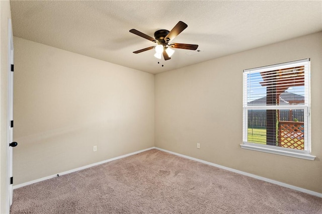 2504 Maplewood Ave, Lowell, AR 72745 - carpeted spare room with ceiling fan and a textured ceiling