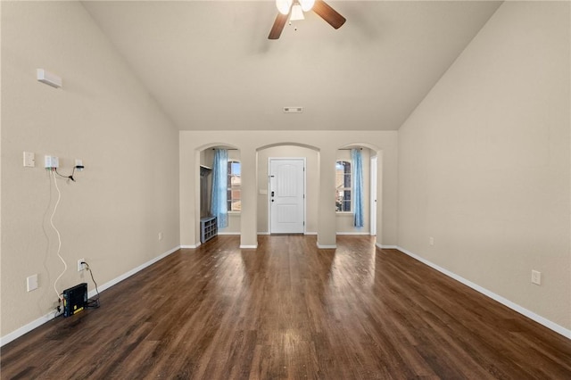 2504 Maplewood Ave, Lowell, AR 72745 - foyer entrance with arched walkways, ceiling fan, dark wood finished floors, and vaulted ceiling