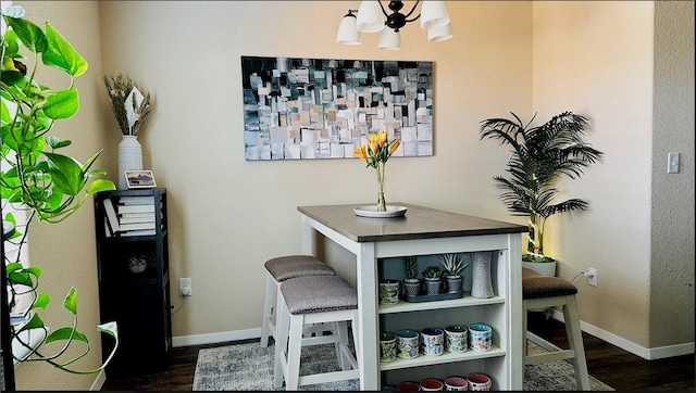 2504 Maplewood Ave, Lowell, AR 72745 - detailed view of a chandelier and wood finished floors