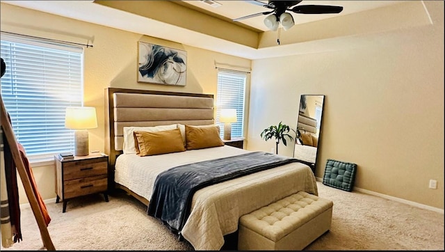 2504 Maplewood Ave, Lowell, AR 72745 - bedroom with carpet, a tray ceiling, and a ceiling fan