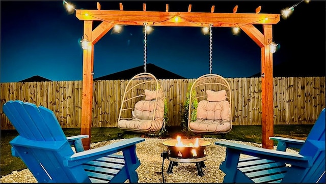 2504 Maplewood Ave, Lowell, AR 72745 - view of patio / terrace with an outdoor fire pit