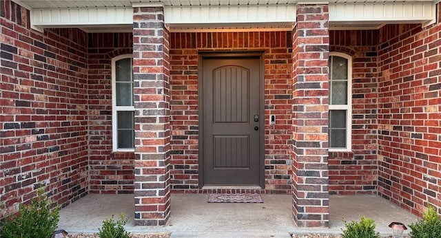 2504 Maplewood Ave, Lowell, AR 72745 - property entrance with brick siding
