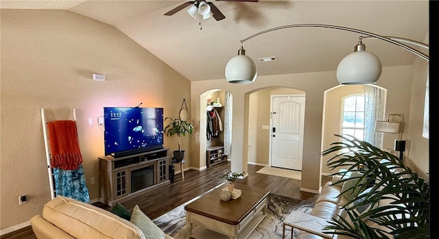 2504 Maplewood Ave, Lowell, AR 72745 - living area with arched walkways, ceiling fan, lofted ceiling, and wood finished floors