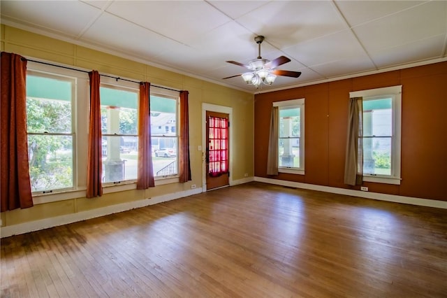 501 Fillmore St, Clarksville, AR 72830 - spare room with wood finished floors, crown molding, and ceiling fan