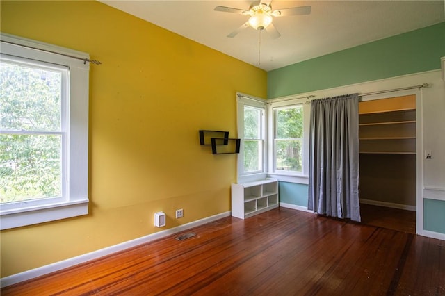 501 Fillmore St, Clarksville, AR 72830 - empty room with wood-type flooring and a ceiling fan