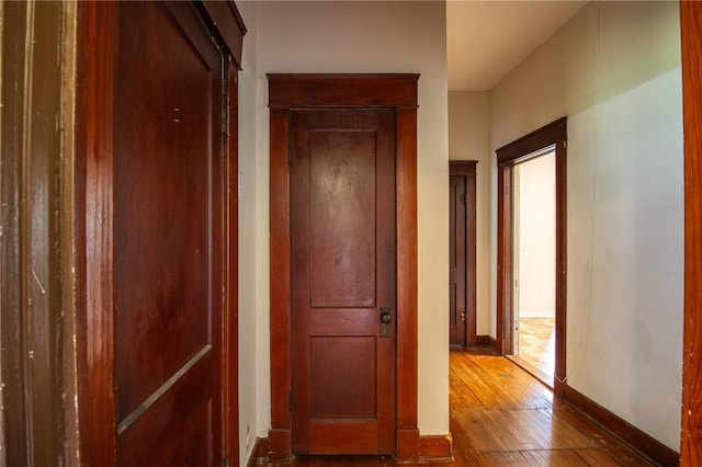 501 Fillmore St, Clarksville, AR 72830 - corridor featuring hardwood / wood-style flooring and baseboards