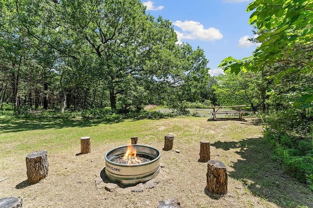 3389 Madison Unit 2405, Huntsville, AR 72740 - view of green lawn featuring a fire pit