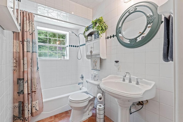 3389 Madison Unit 2405, Huntsville, AR 72740 - bathroom featuring tile walls, shower / bath combo, and tile patterned floors