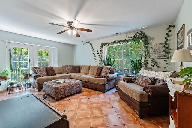 3389 Madison Unit 2405, Huntsville, AR 72740 - living area with light tile patterned flooring, a ceiling fan, and french doors