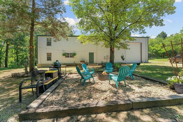 3389 Madison Unit 2405, Huntsville, AR 72740 - view of patio / terrace featuring an outbuilding, an outdoor fire pit, and area for grilling