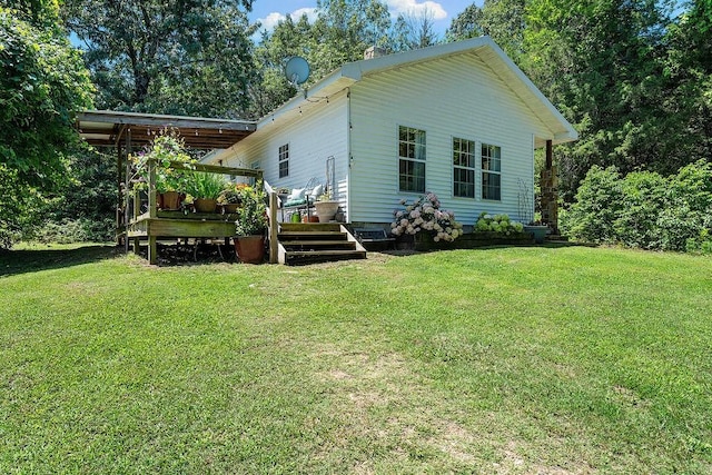 3389 Madison Unit 2405, Huntsville, AR 72740 - back of property featuring a wooden deck and a yard