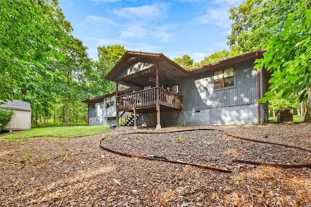 8 Kenilworth Dr, Bella Vista, AR 72714 - back of house featuring a ceiling fan, a deck, stairway, and crawl space