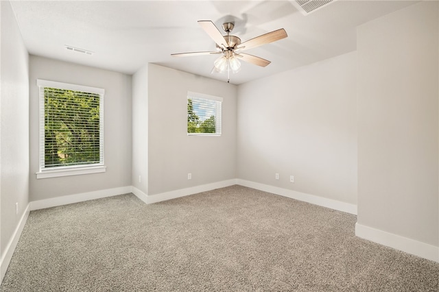 20 Dirleton Dr, Bella Vista, AR 72715 - carpeted empty room featuring baseboards and ceiling fan