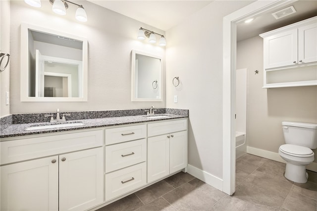 20 Dirleton Dr, Bella Vista, AR 72715 - bathroom featuring double vanity, washtub / shower combination, and tile patterned flooring