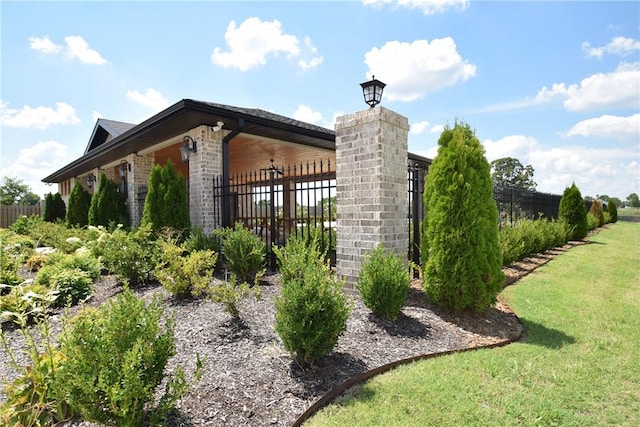 1052 Morra Ave, Tontitown, AR 72762 - view of side of home with brick siding