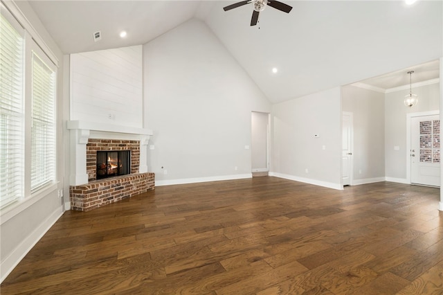 1052 Morra Ave, Tontitown, AR 72762 - unfurnished living room with a ceiling fan, wood-type flooring, a brick fireplace, plenty of natural light, and recessed lighting