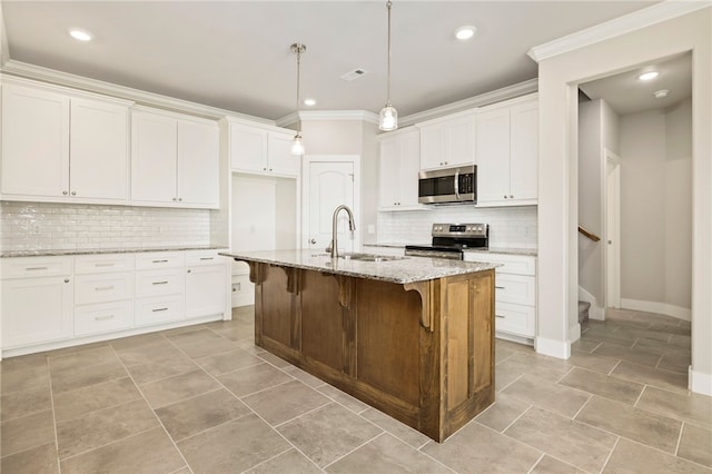 1052 Morra Ave, Tontitown, AR 72762 - kitchen with stainless steel appliances, tasteful backsplash, white cabinetry, light stone counters, and crown molding