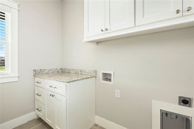 1052 Morra Ave, Tontitown, AR 72762 - washroom with hookup for an electric dryer, cabinet space, hookup for a washing machine, and tile patterned flooring