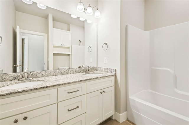 1052 Morra Ave, Tontitown, AR 72762 - full bathroom featuring double vanity and shower / bathtub combination