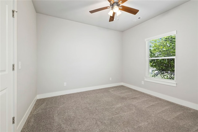 1052 Morra Ave, Tontitown, AR 72762 - empty room with carpet flooring and a ceiling fan