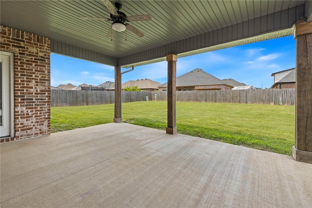 1052 Morra Ave, Tontitown, AR 72762 - deck featuring ceiling fan, a patio, a fenced backyard, and a residential view