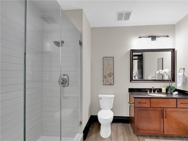 401 W Watson St Unit 507, Fayetteville, AR 72701 - bathroom with a shower stall, vanity, and wood tiled floors
