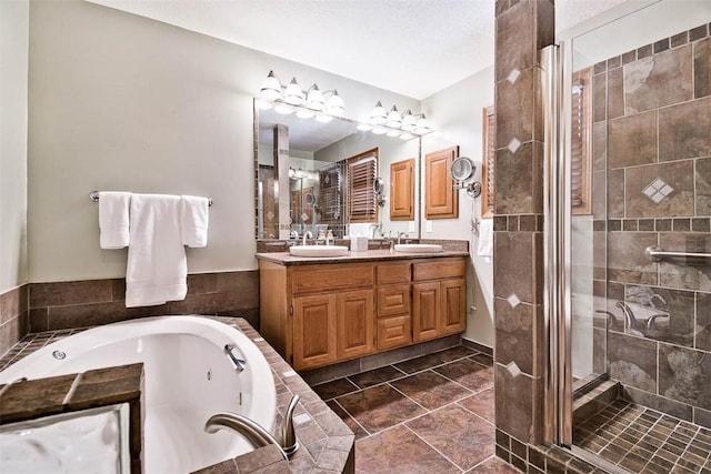 1 May Ln, Bella Vista, AR 72715 - bathroom featuring double vanity, a whirlpool tub, and a stall shower
