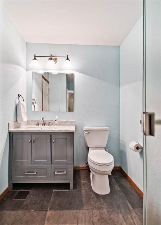 1 May Ln, Bella Vista, AR 72715 - bathroom with baseboards and vanity
