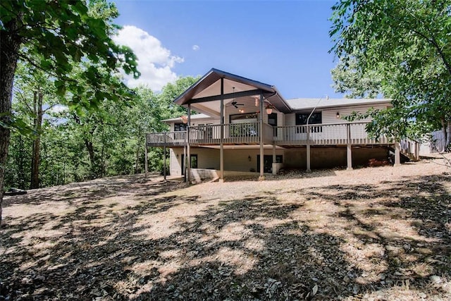 1 May Ln, Bella Vista, AR 72715 - back of property featuring a ceiling fan and a wooden deck