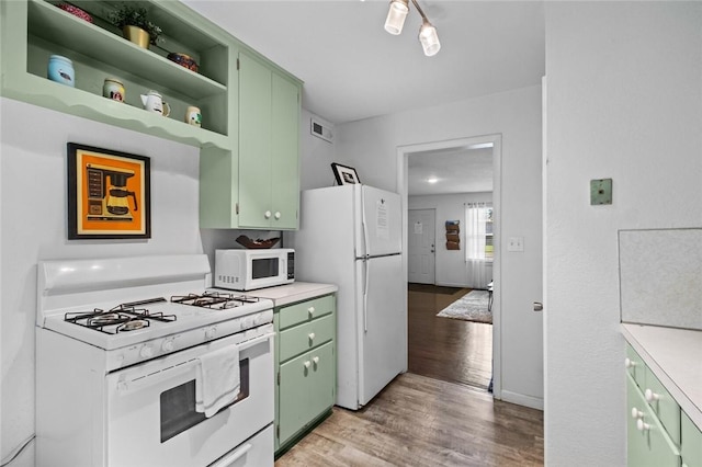 1115-1117 S Ellis Ave, Fayetteville, AR 72701 - kitchen featuring green cabinetry, white appliances, light wood-style flooring, and light countertops