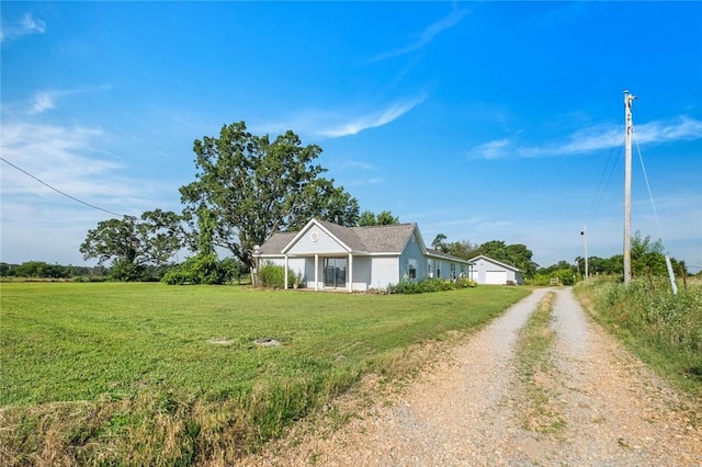 13183 Shady Grove Rd, Gravette, AR 72736 - ranch-style house with driveway and a front yard