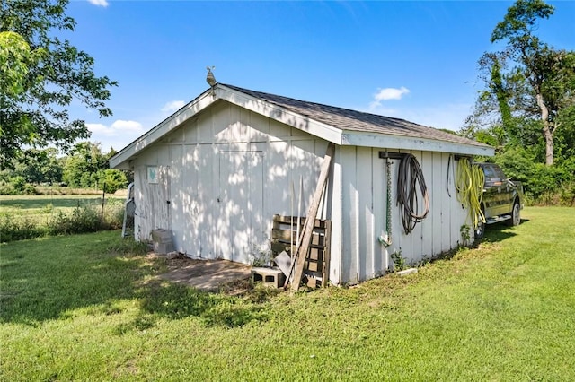 13183 Shady Grove Rd, Gravette, AR 72736 - view of property exterior featuring a yard and an outdoor structure