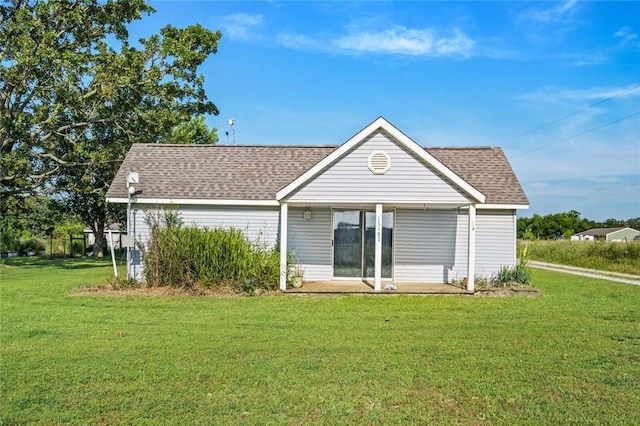 13183 Shady Grove Rd, Gravette, AR 72736 - back of house with a yard, a shingled roof, and a patio