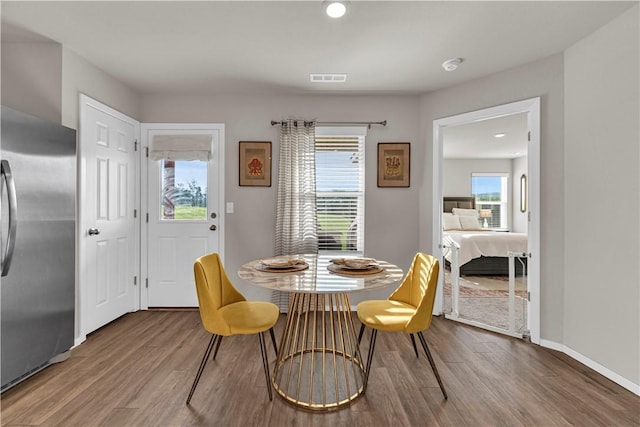 3461 Red Tail Way, Farmington, AR 72730 - dining room featuring wood finished floors and recessed lighting