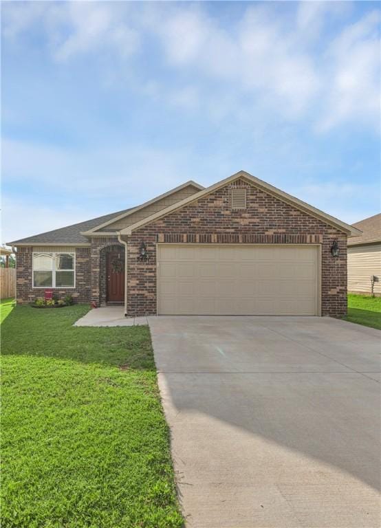 3461 Red Tail Way, Farmington, AR 72730 - single story home with driveway, a garage, and brick siding
