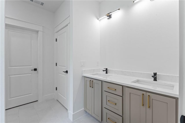 17 Westmorland Dr, Bella Vista, AR 72714 - full bathroom with double vanity and tile patterned flooring