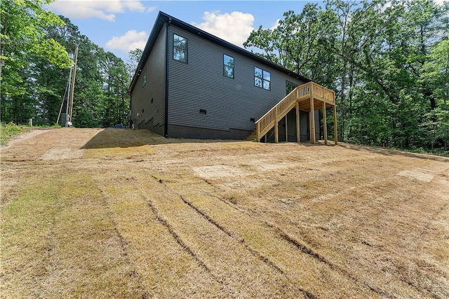 17 Westmorland Dr, Bella Vista, AR 72714 - rear view of property featuring a deck and stairway
