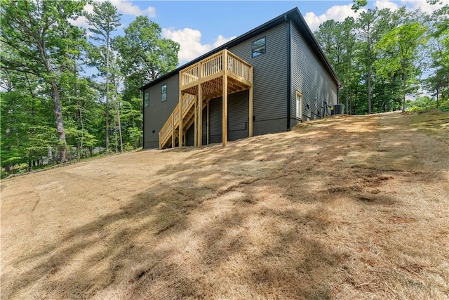 17 Westmorland Dr, Bella Vista, AR 72714 - rear view of house with a deck and stairway