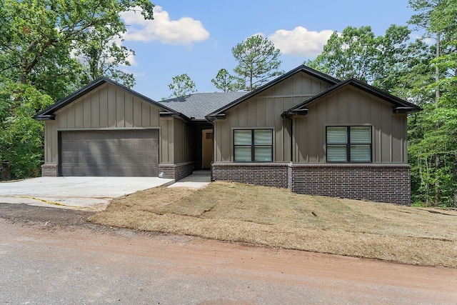 17 Westmorland Dr, Bella Vista, AR 72714 - ranch-style home with a garage, brick siding, concrete driveway, board and batten siding, and a shingled roof