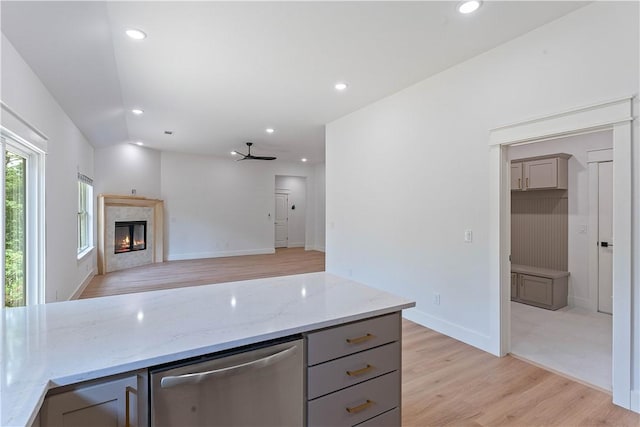 17 Westmorland Dr, Bella Vista, AR 72714 - kitchen with gray cabinetry, dishwasher, light wood-style flooring, light stone countertops, and recessed lighting