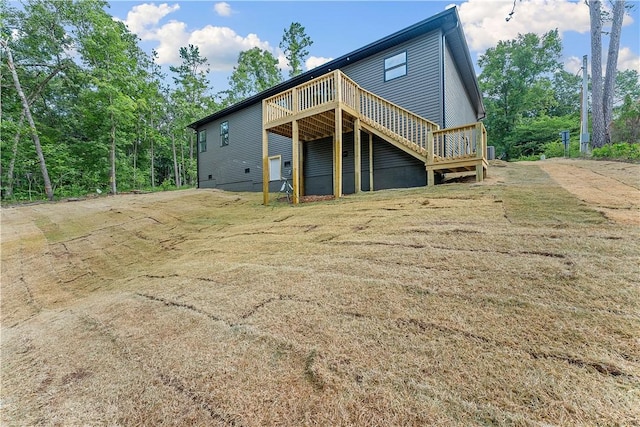 127 Overton Dr, Bella Vista, AR 72714 - back of house featuring a wooden deck