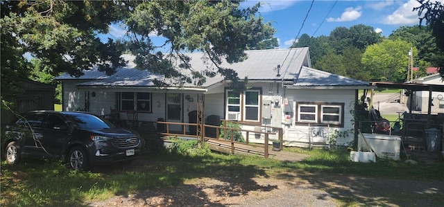204 Glade St, Marshall, AR 72650 - back of house featuring a metal roof