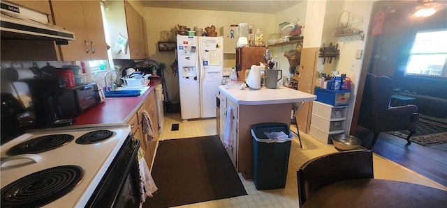 204 Glade St, Marshall, AR 72650 - kitchen featuring white refrigerator with ice dispenser, exhaust hood, light floors, a kitchen island, and range with electric cooktop