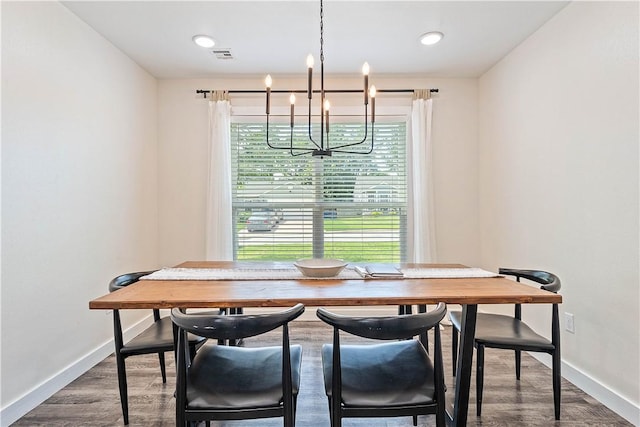 2905 NE 12th St, Bentonville, AR 72712 - dining space with a chandelier and dark wood finished floors