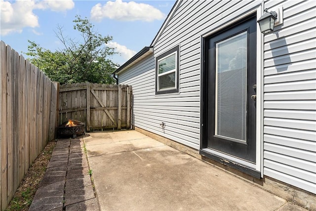 2905 NE 12th St, Bentonville, AR 72712 - view of patio featuring a fire pit
