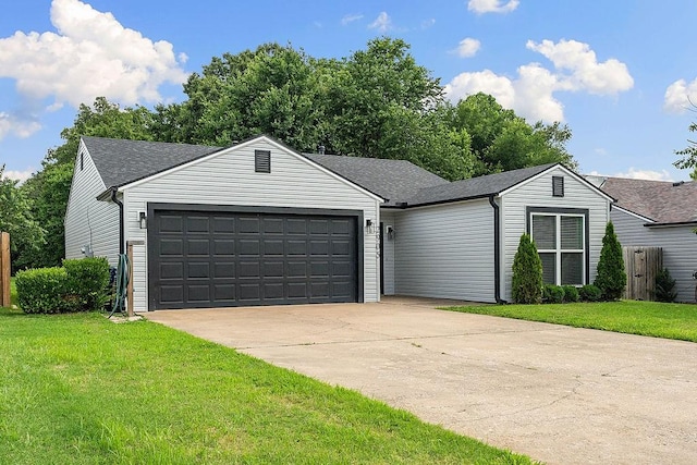 2905 NE 12th St, Bentonville, AR 72712 - single story home with an attached garage, a front yard, driveway, and a shingled roof
