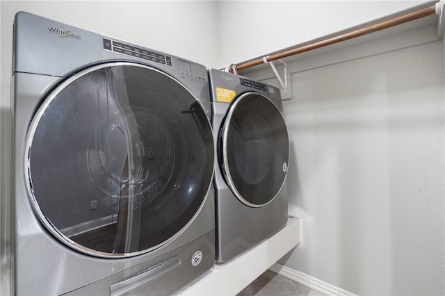 3915 Baltic St, Springdale, AR 72762 - laundry area with separate washer and dryer and baseboards