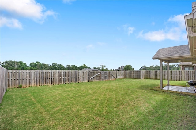 3915 Baltic St, Springdale, AR 72762 - fenced backyard with a patio